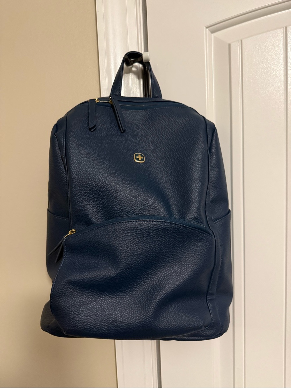SwissGear Navy Pebbled Leatherette Backpack with Gold Accents